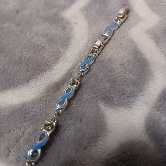Blue enamel and crystal infinity bracelet. - Picture 3 of 14